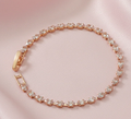 Rose Gold Crystal Link Bracelet. Round crystals linked in rose gold, with an adjustable clasp.