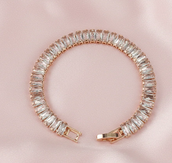 Rose Gold Baguette Tennis Bracelet. A full row of baguette crystals set in rose gold.
