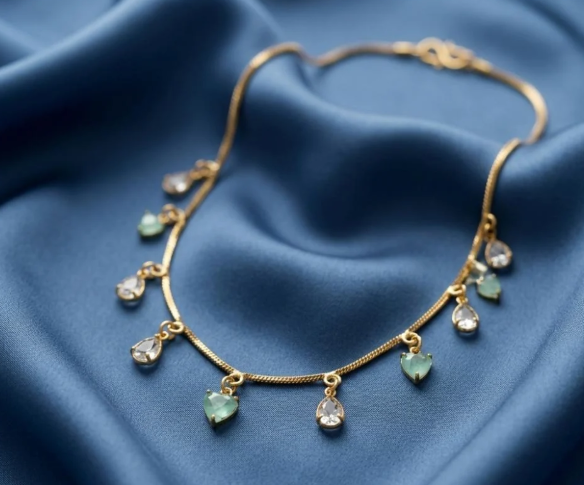Mint & Crystal Heart Charm Chain. Mint and clear heart crystals hanging from a gold snake chain.