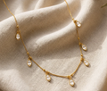 Marquise Crystal Fringe Chain. Clear marquise crystals hanging from a fine gold chain.