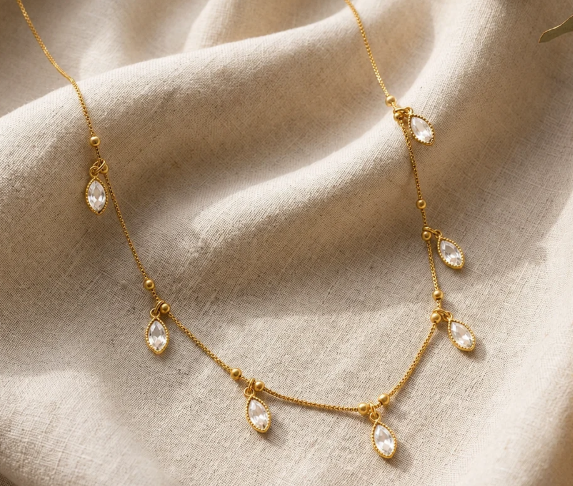 Marquise Crystal Fringe Chain. Clear marquise crystals hanging from a fine gold chain.