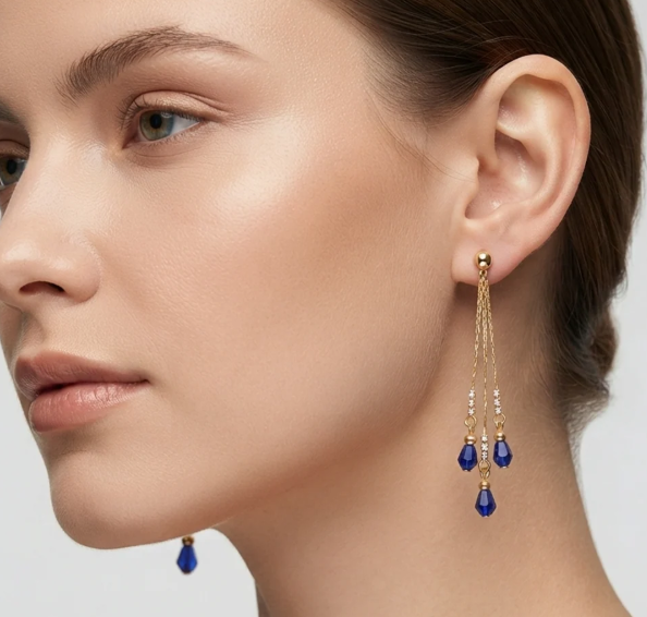 Three-Strand Crystal Bead Drop Earrings in Royal Blue. Three fine gold strands finished with faceted crystal beads that catch the light as you move.