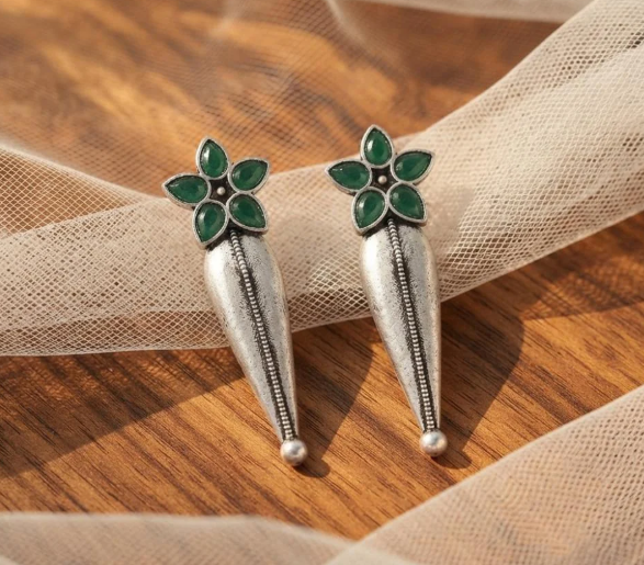 Flower Stud Silver Drop Earrings in Green. Oxidised silver-finish earrings with a five-petal stone flower stud and a long textured teardrop drop with a beaded centre line.