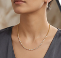 Gold Crystal Chain Necklace. A fine gold chain set with a delicate line of crystals.