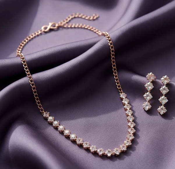 Rose Gold Crystal Cluster Necklace Set. Rose-gold chain with clustered crystal flowers and matching drop earrings.