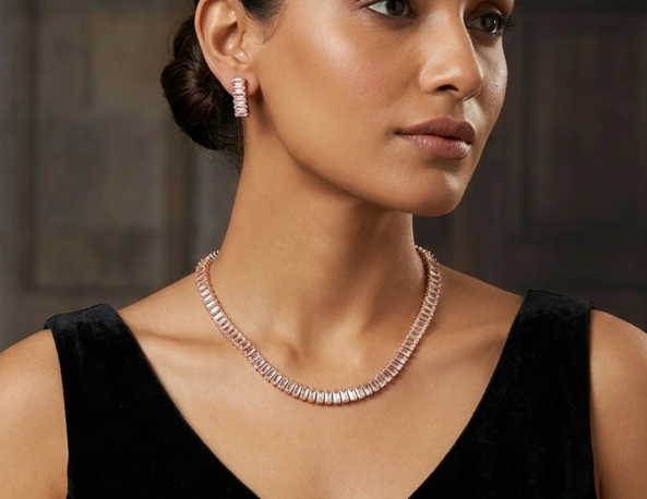 Rose Gold Baguette Necklace. A sleek rose-gold collar of baguette crystals.